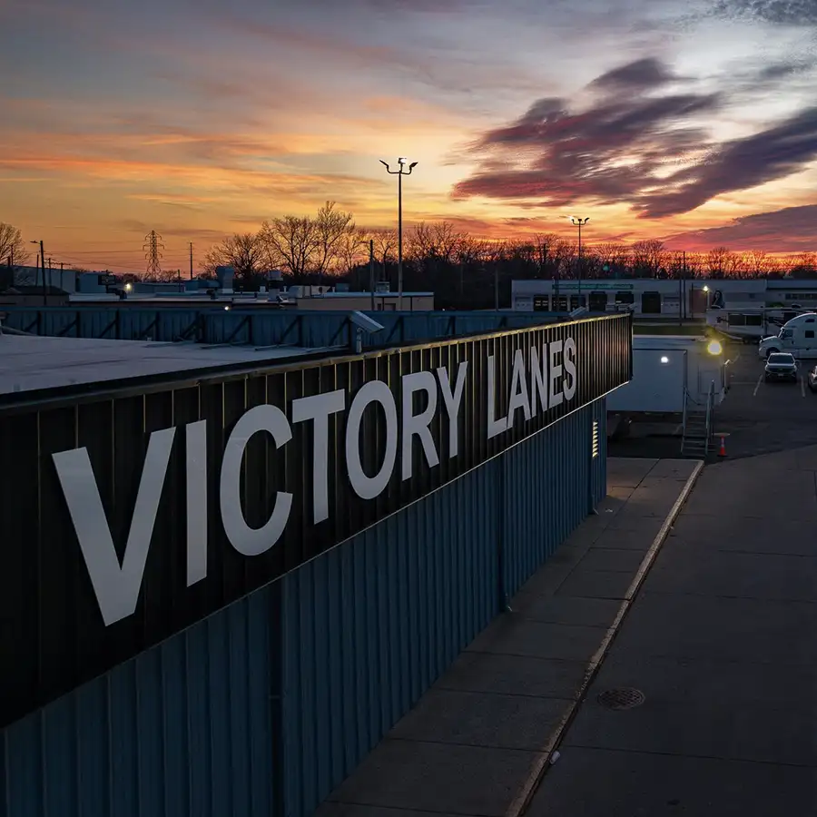 Sunset view of the Victory Lanes building sign outside the bowling center in Decatur, IL - photo by Neil Wicker Aerial Photography
